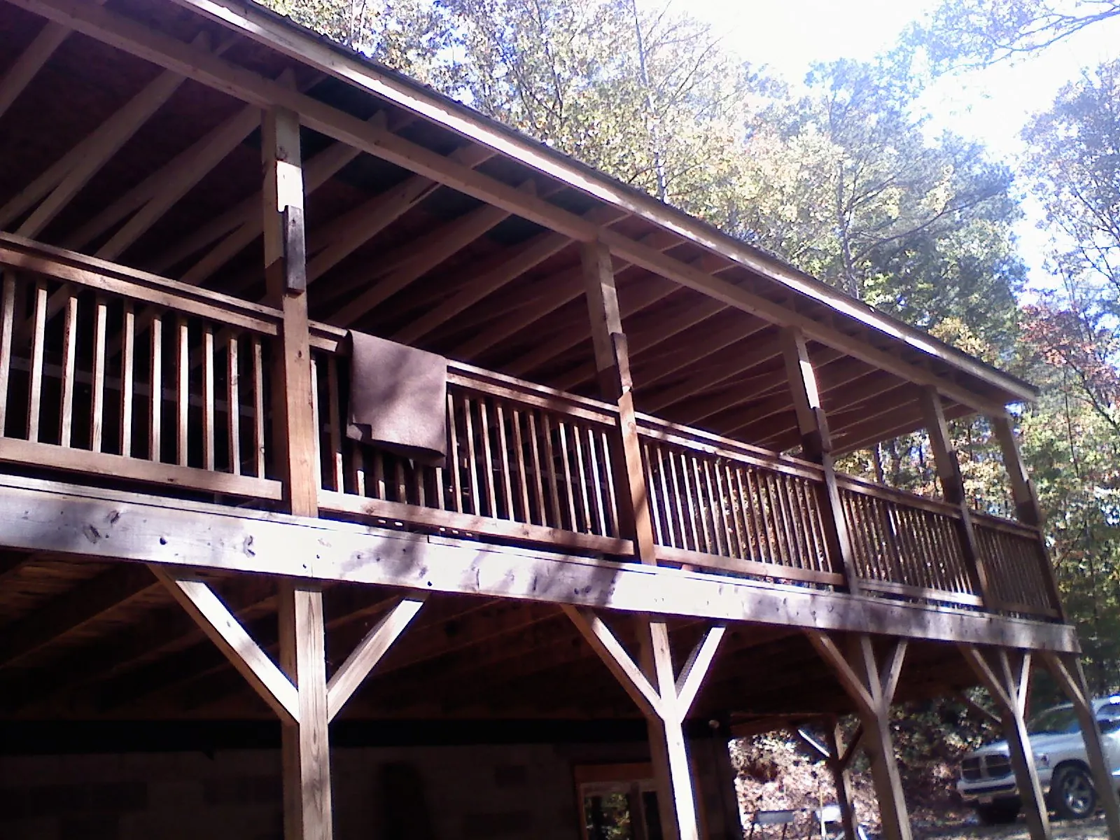 Timber framing under a new elevated porch and deck — Roof Leak Repair in Swiftwater by Roofing Brothers
